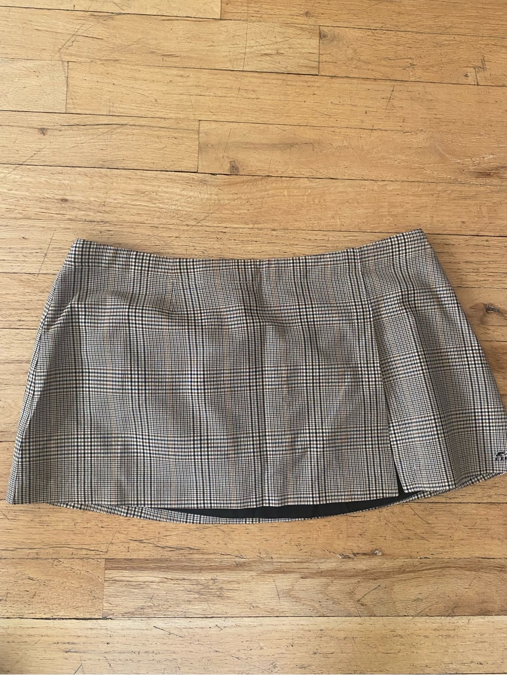 Miaou mini skirt. Brown plaid pattern. Size small. Retails for $165.